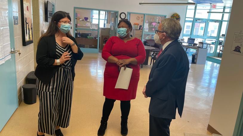 Gov. Mike DeWine (right) tours the Champion Avenue location of Columbus Early Learning Centers on March 11, 2022.  CEO Gina Ginn (left) introduced Tashauna Hardy (center), who teaches at the center and has two children enrolled there.