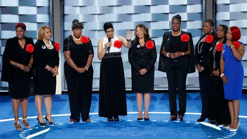 Sybrina Fulton, Geneva Reed-Veal, Lucy McBath, Gwen Carr, Cleopatra Pendleton, Maria Hamilton, Lezley McSpadden and Wanda Johnson from Mothers of the Movement speak during the second day of the Democratic National Convention in Philadelphia , Tuesday, July 26, 2016. (AP Photo/J. Scott Applewhite)