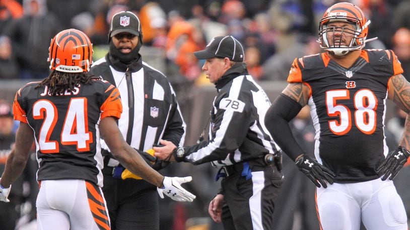 Bengals cornerback Adam Jones (24) and linebacker Rey Maualuga (58)plead their case to the officials after a slew of second half penalties during their game against the Steelers, at Paul Brown Stadium, Sunday, Dec. 18, 2016. GREG LYNCH / STAFF