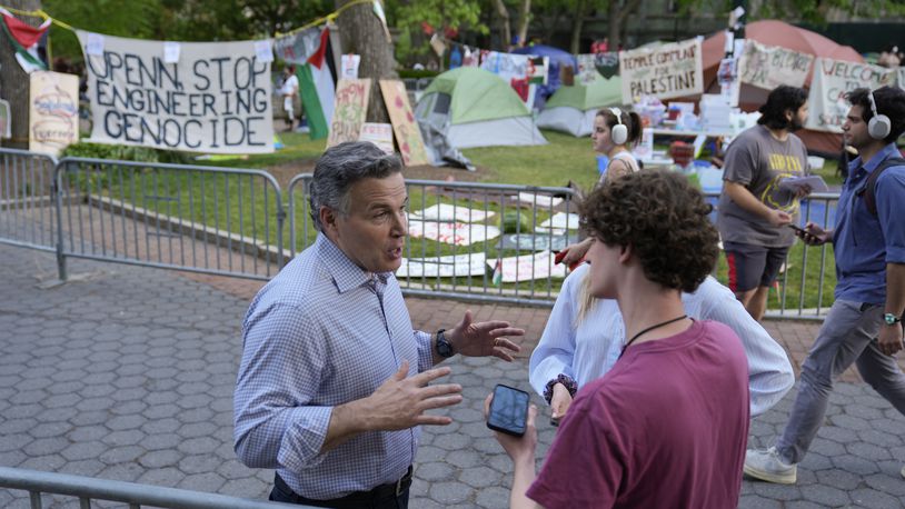Republican U.S. Senate candidate Dave McCormick speaks outside a Gaza Solidarity Encampment at the University of Pennsylvania in Philadelphia, Wednesday, May 1, 2024. (AP Photo/Matt Rourke)