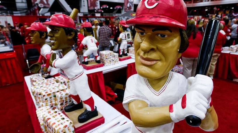 The bobblehead booth was decorated with oversized bobbleheads of former Reds players, like this one of Pete Rose, during RedsFest Friday, Dec 2, 2016, at Duke Energy Convention Center in Cincinnati. NICK GRAHAM/STAFF
