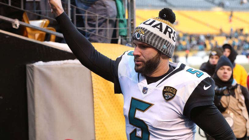 Jacksonville Jaguars quarterback Blake Bortles (5) celebrates with fans in the stands after defeating the Pittsburgh Steelers in the AFC Divisional Playoff game 45-42 at Heinz Field.