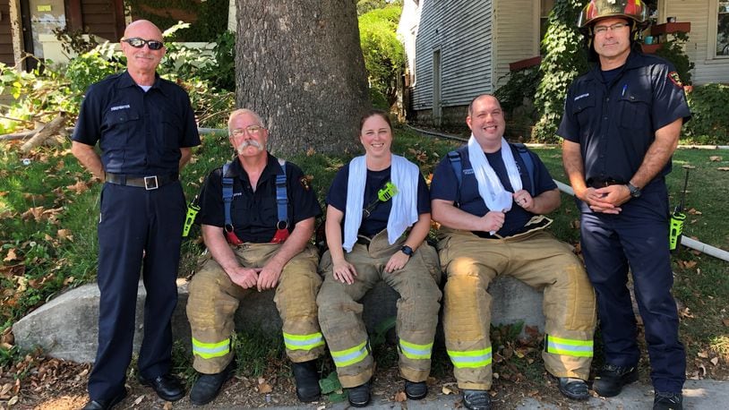 From the left, Dayton firefighters Marty Wannermacher, Eric Mays, Debbie Nagy, Jim Burneka Jr. and Craig Brunner. Wannermacher, Burneka and Nagy had cancer and the city challenged their workers' compensation claims. CONTRIBUTED