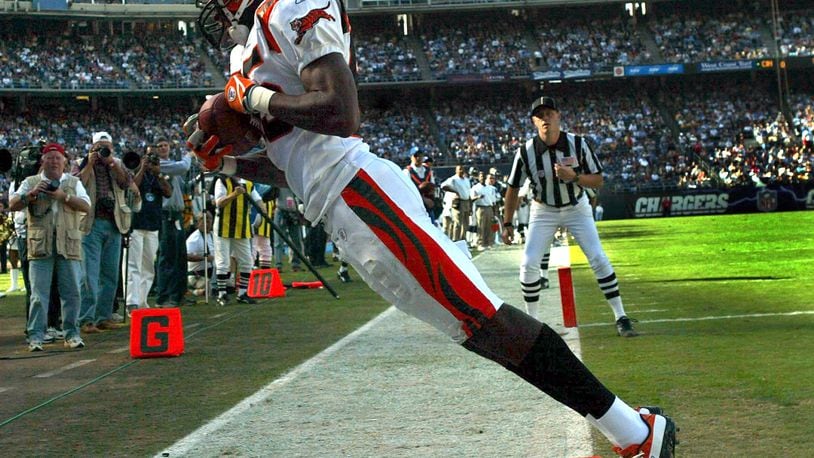 SAN DIEGO - NOVEMBER 23, 2003: Chad Johnson #85 of the Cincinnatti Bengals gets his toes in the end zone to score a touchdown against the San Diego Chargers in the first-half NFL action November 23, 2003 at Qualcomm Stadium in San Diego, California. (Photo by Donald Miralle/Getty Images)