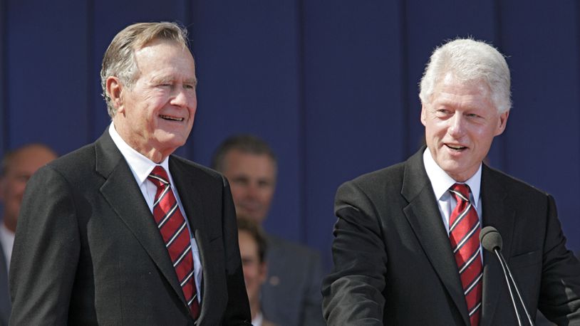 Former United States Presidents George H.W. Bush and Bill Clinton pictured in 2005.