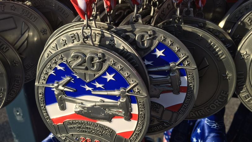 Runners medals stand ready at the finish line of the 20th anniversary of the Air Force Marathon. BARRIE BARBER/STAFF