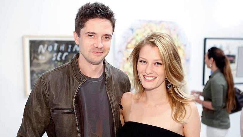 Topher Grace and Ashley Hinshaw attend the Art of Elysium's 9th annual Pieces of Heaven event at Siren Studios on April 28, 2016 in Hollywood, California. (Photo by Randy Shropshire/Getty Images for Art of Elysium)