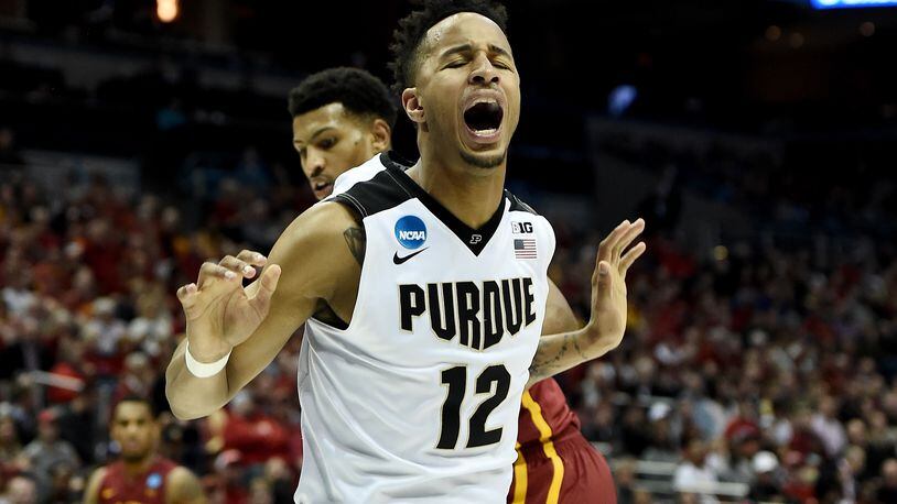 MILWAUKEE, WI - MARCH 18: Vince Edwards #12 of the Purdue Boilermakers reacts after dunking in the second half against the Iowa State Cyclones during the second round of the 2017 NCAA Tournament at BMO Harris Bradley Center on March 18, 2017 in Milwaukee, Wisconsin. (Photo by Stacy Revere/Getty Images)