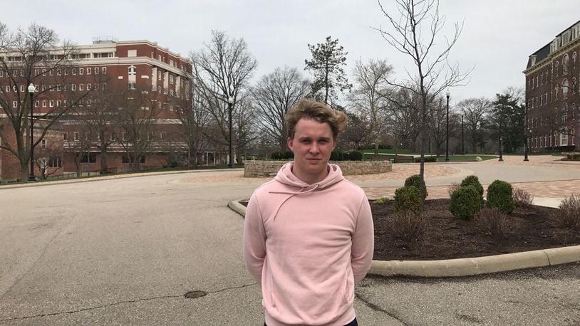 Jonas Fjeldberg, the Atlantic 10 Offensive Player of Year and UD s MVP this past season who is from Jessheim, Norway, stands on the deserted University of Dayton campus Saturday afternoon. Tom Archdeacon/STAFF