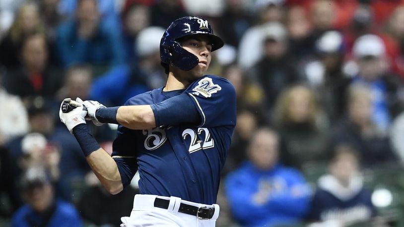 MILWAUKEE, WISCONSIN - MARCH 30:  Christian Yelich #22 of the Milwaukee Brewers swings at a pitch during the eighth inning of a game against the St. Louis Cardinals at Miller Park on March 30, 2019 in Milwaukee, Wisconsin. (Photo by Stacy Revere/Getty Images)