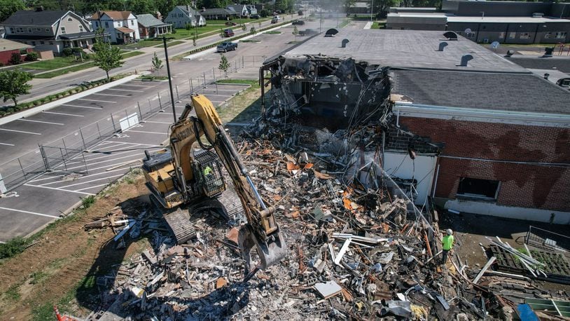 Crews demolish C.F. Holiday Elementary School at 4100 South Dixie Drive Tuesday June 21, 2022. JIM NOELKER/STAFF