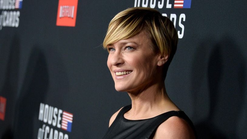 FILE PHOTO:  Actress Robin Wright arrives at the special screening of Netflix's "House of Cards" Season 2 at the Directors Guild Of America on February 13, 2014 in Los Angeles, California.  (Photo by Kevin Winter/Getty Images)