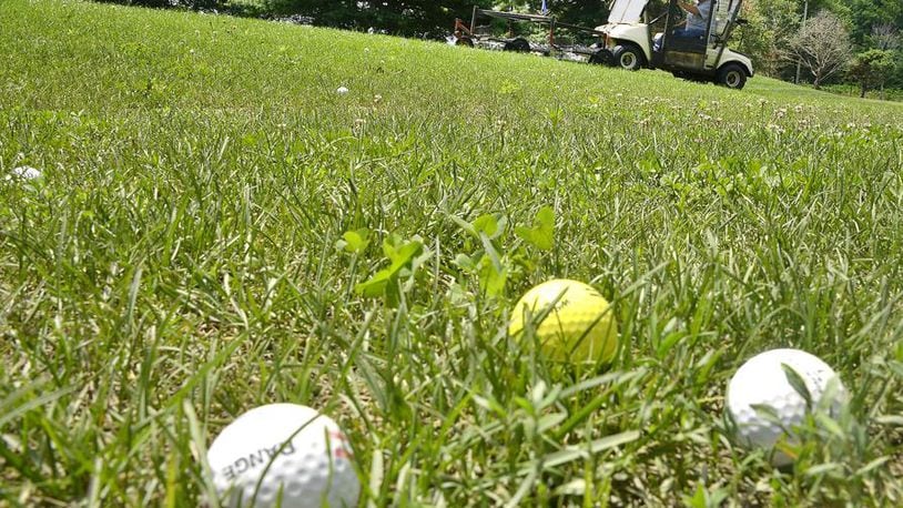 Golf balls on a course.