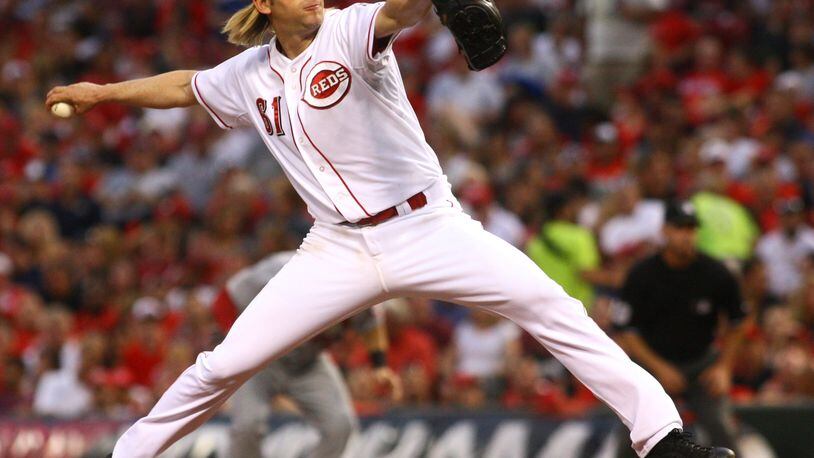The Reds’ Bronson Arroyo pitches against the Cardinals on Friday, Aug. 2, 2013, at Great American Ball Park in Cincinnati. David Jablonski/Staff