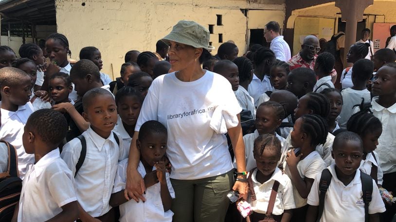 Veleta Jenkins, founder of the Library for Africa, visits school children in Liberia. COURTESY OF VELETA JENKINS