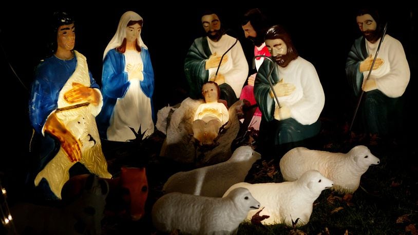 PASADENA, CA, DECEMBER 17:  A life-size nativity scene glows in a yard on December 17, 2003 in Pasadena, California. Many of southern California's better holiday lights displays are in Pasadena.    (Photo by David McNew/Getty Images)