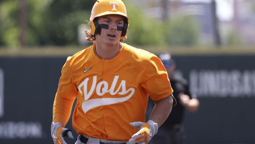 Tennessee's Jordan Beck rounds the bases after hitting a three-run home run against Notre Dame in the fifth inning during an NCAA college baseball super regional game Saturday, June 11, 2022, in Knoxville, Tenn. (AP Photo/Randy Sartin)