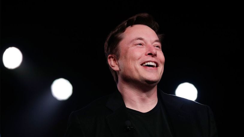 FILE PHOTO: In this March 14, 2019, file photo Tesla CEO Elon Musk speaks before unveiling the Model Y at Tesla's design studio in Hawthorne, Calif.