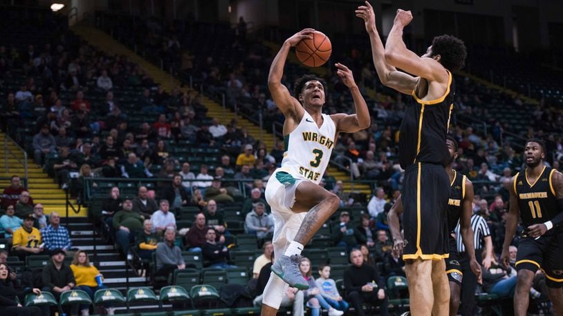 Wright State’s Mark Hughes goes up for a shot against Milwaukee on Jan. 24, 2019, at the Nutter Center. Joseph Craven/CONTRIBUTED