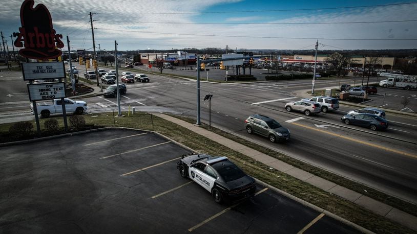 The Huber Heights intersection of Old Troy Pike and Merily Way near I-70 is being monitored by Huber Heights police as of Thursday, Jan. 5, in response to mounting concerns regarding motorists who are turning left onto Merily Way and blocking the intersection. JIM NOELKER/STAFF