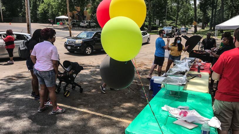 DECA Prep held a drive-through Juneteenth celebration at the school on Homewood Avenue in Dayton in 2020. Deaunna Watson organized the event and said family and community were invited to the COVID-19 aware event. JIM NOELKER/STAFF