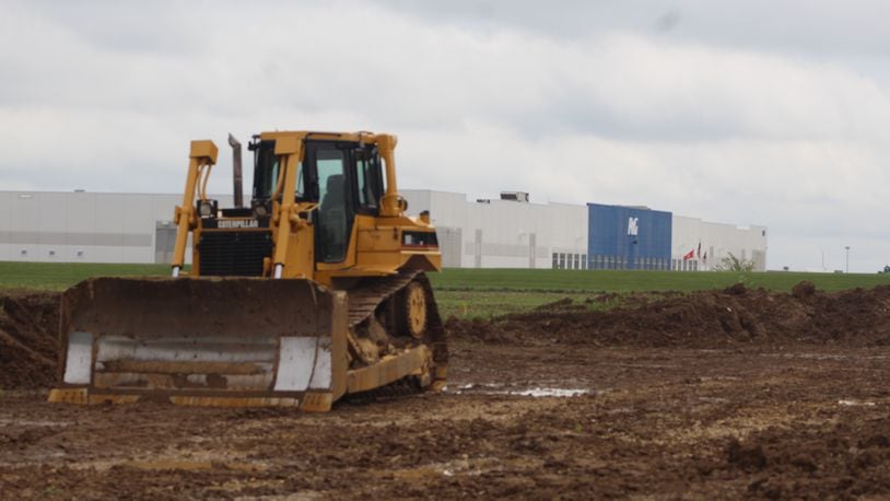 A bulldozer sits on a site south of Proctor & Gamble facility in Union. CORNELIUS FROLIK / STAFF