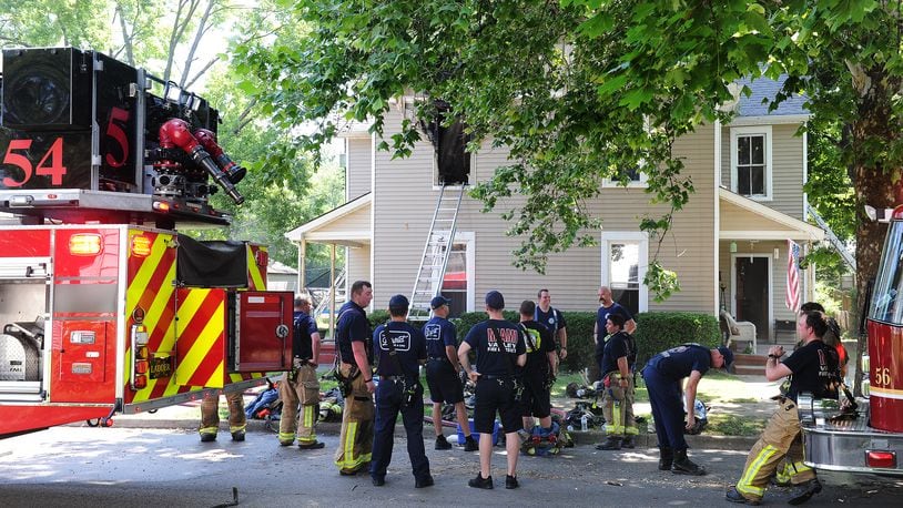 The Miami Valley Fire District was called around 11:15 a.m. to the 400 block of North Fourth Street in Miamisburg Wednesday June 22, 2022 and reported heavy smoke and flames were coming from a duplex. Mutual aid was called for man power due to the hot and humid conditions. MARSHALL GORBY\STAFF
