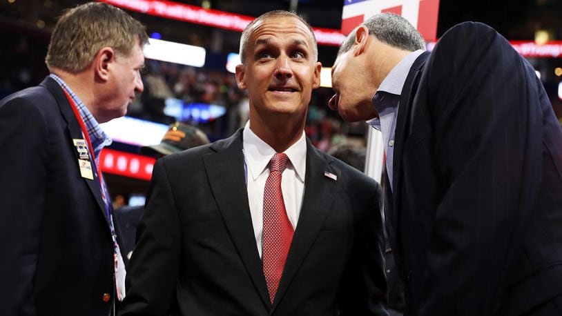 Corey Lewandowski (center), former campaign manager for Donald Trump, speaks with delegates on the first day of the Republican National Convention on July 18, 2016, at the Quicken Loans Arena in Cleveland, Ohio. (Photo by Joe Raedle/Getty Images)