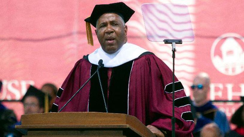 Billionaire technology investor and philanthropist Robert F. Smith announces he will provide grants to wipe out the student debt of the entire 2019 graduating class at Morehouse College in Atlanta, Sunday, May 19, 2019.
