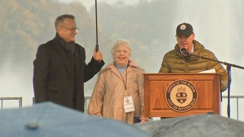 Tom Hanks, Joanne Rogers and Michael Keaton speak at the Rally for Peace in Pittsburgh.