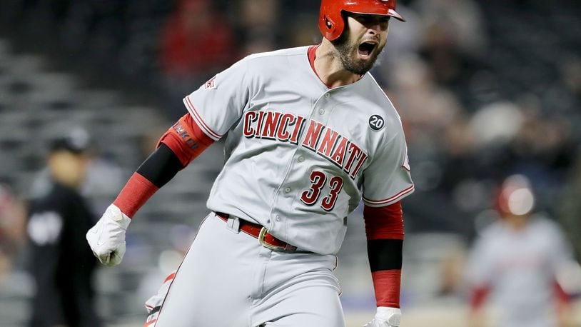 NEW YORK, NEW YORK - APRIL 29: Jesse Winker #33 of the Cincinnati Reds celebrates his game winning home run in the ninth inning against the New York Mets at Citi Field on April 29, 2019 in the Flushing neighborhood of the Queens borough of New York City.The Cincinnati Reds defeated the New York Mets 5-4. (Photo by Elsa/Getty Images)