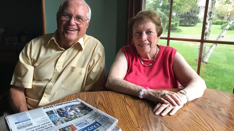 Bruce and Carol Davidson are proud, lifelong Troy Trojans and Bruce is a lifelong subscriber to the Dayton Daily News. STAFF PHOTO / SARAH FRANKS