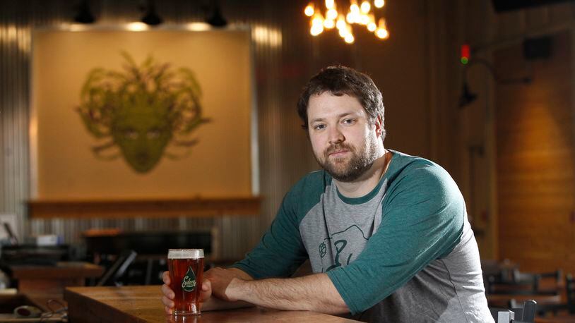 Neil Chabut is the owner of Eudora Brewing Company which will open the doors to its new Kettering brewery at 3022 Wilmington Pike on Jan. 11 The new site has a 20,000-square-foot taproom, restaurant and 18 taps of new and classic Eudora beers, craft root beer and nitro cold-brew coffee.  LISA POWELL / STAFF