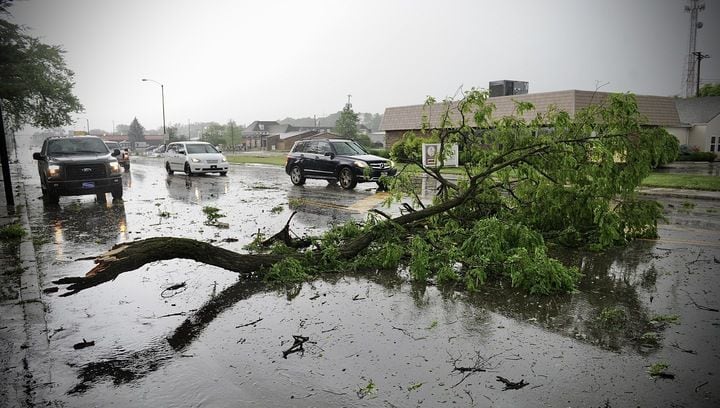 Tree branches and debris on N. Limestone St. blocking traffic Wednesday, June 8, 2022. MARSHALL GORBY \STAFF