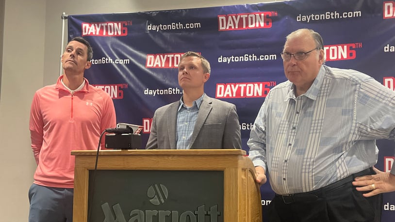 George Janky (right) joined Matt Farrell (left) and Keith Waleskowski at a press conference Oct. 26 announcing the creation of Dayton 6th, a new collective supporting UD athletes in the NIL era.  David Jablonski/Staff