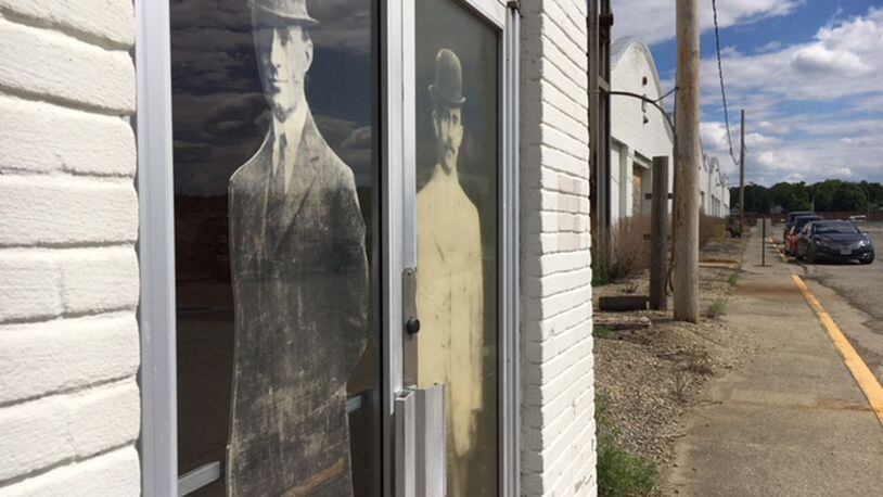 The front doors of the airplane factory the Wright Brothers built between West Third Street and what today is U.S. 35. THOMAS GNAU/STAFF