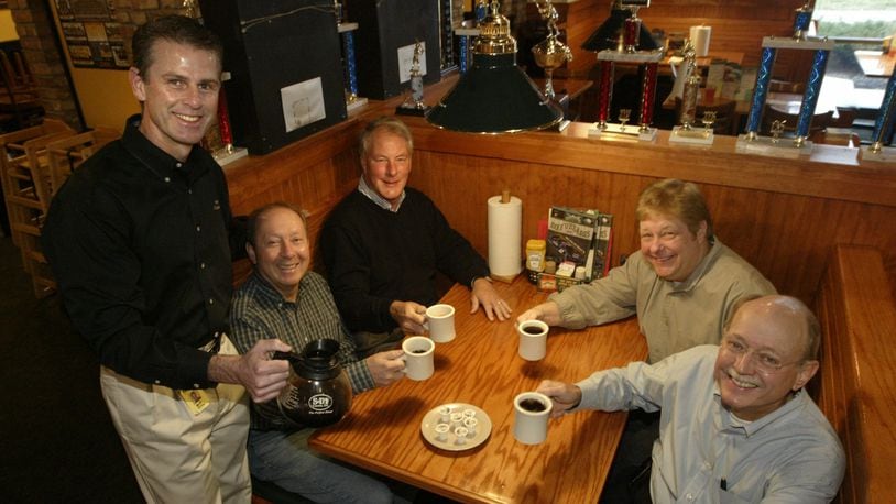 Bill DeFries, at left, with friends Bud Hauser, Tom Meyer, Scott Hull and Mike Bevis at Beef O’Brady’s restaurant in a 2009 photo. CHRIST STEWART/STAFF