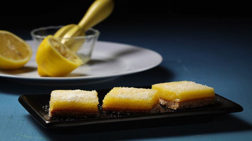 Sugar scented with finely grated lemon zests finishes off the tops of the lemon bars. (Abel Uribe/Chicago Tribune/TNS)