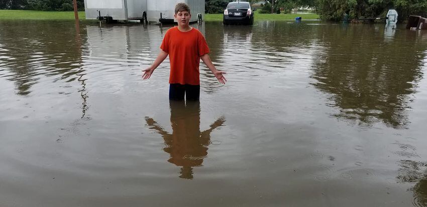 Photos: Flooded streets follow Friday's storms