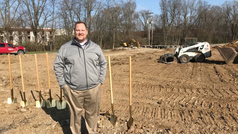 Harrison Twp. Administrator Kristofer McClintick stands in front of the construction site of a new Restaurant Depot store before the tornado. KAITLIN SCHROEDER/STAFF