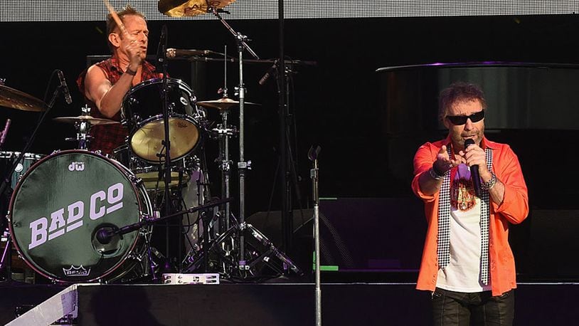 WEST PALM BEACH, FL - MAY 29:  Founding members Simon Kirke (drums) and Paul Rodgers (Lead Singer) of Bad Company perform during Joe Walsh & Bad Company One Hell Of A Night Tour - at Perfect Vodka Amphitheatre on May 29, 2016 in West Palm Beach, Florida.  (Photo by Rick Diamond/Getty Images)