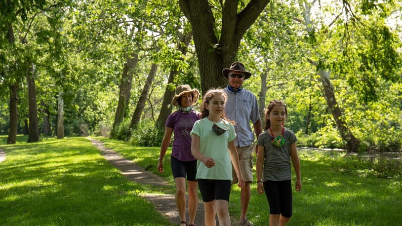 A walk outdoors is something the whole family can enjoy together. Outdoor activity promotes physical and mental wellness. CONTRIBUTED PHOTO FIVE RIVERS METROPARKS