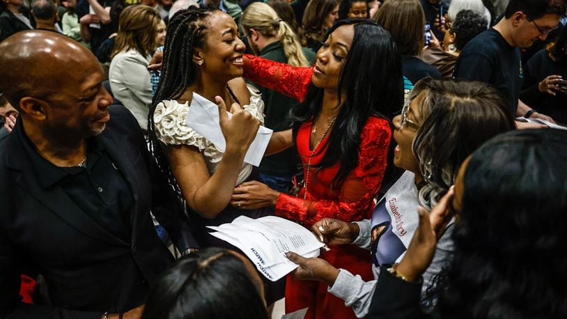 Boonshoft School of Medicine students from left, Aisha Jamison and Elisabeth Adkins celebrate their Match Day assignments at Wright State University, Friday, March 17, 2023. JIM NOELKER/STAFF