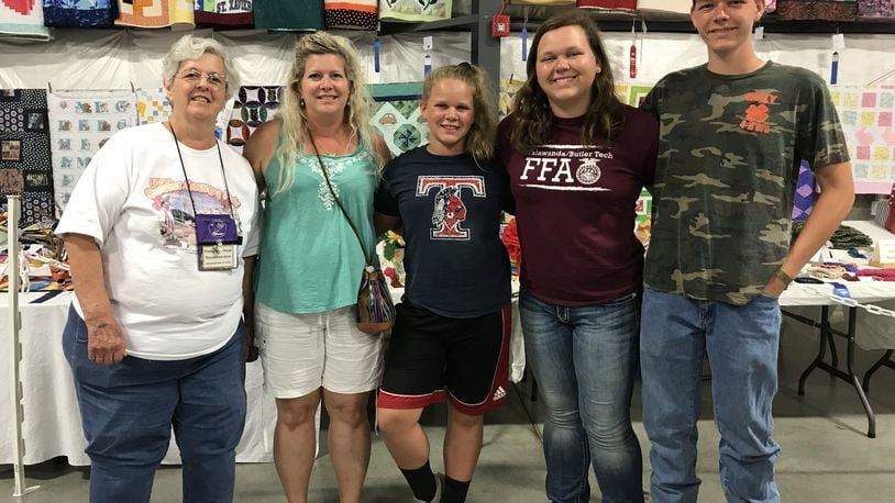 From left: Patsy Morhead, Jenni Tussey, Shelby Tussey, Rachel Tussey, and Josh Tussey. The family has been involved in the Butler County Fair for generations. STAFF/EMMA STIEFEL