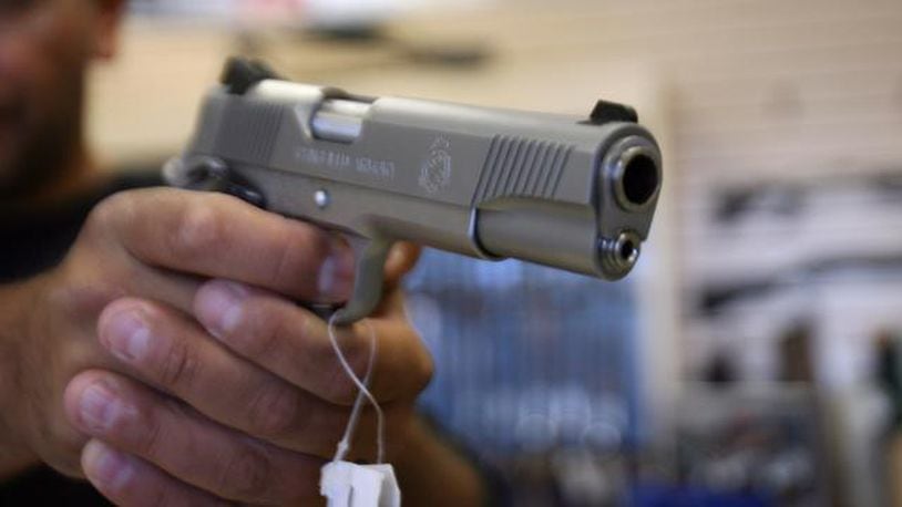 Federal background checks for firearm sales and concealed carry permits increased in Ohio last month, which came after a gunman in the Oregon District went one of the worst mass shooting sprees in state history. GABRIEL BOUYS/AFP/Getty Images