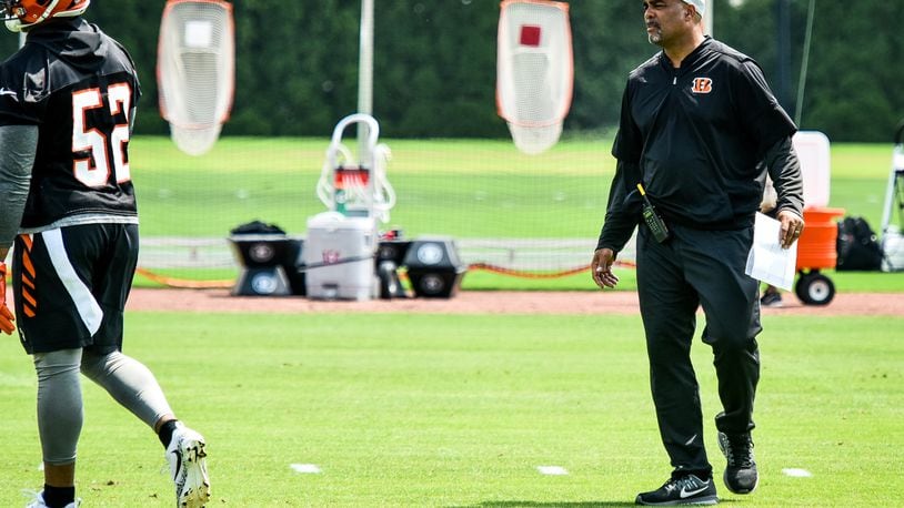 The Cincinnati Bengals’ defensive coordinator Teryl Austin oversees the defense during organized team activities Tuesday, May 22 at the practice facility near Paul Brown Stadium in Cincinnati. NICK GRAHAM/STAFF