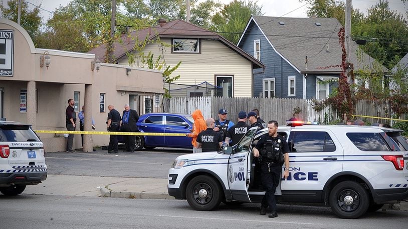 Dayton police are investigating a shooting at the FamFirst Barber Shop Thursday afternoon, Oct. 21, 2021, after two gunshot victims arrived at Kettering Health Dayton. MARSHALL GORBY/STAFF