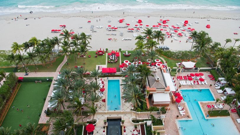 View from a suite at Acqualina of the resort grounds and the beach. (Alan Behr/TNS)
