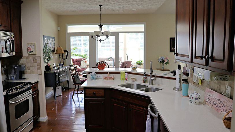 A two-level peninsula counter wraps around the kitchen, dividing the kitchen from the dining area but also allowing for extra counter space. Contributed by Kathy Tyler
