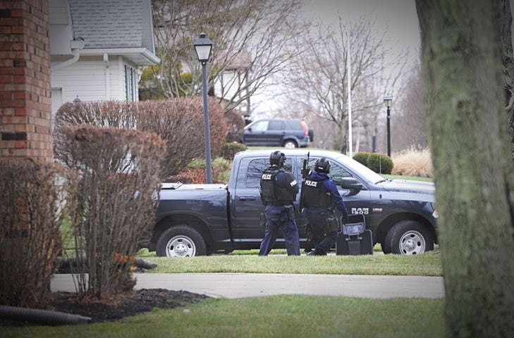 PHOTOS: Neighborhood blocked off after reported shots fired in Springfield